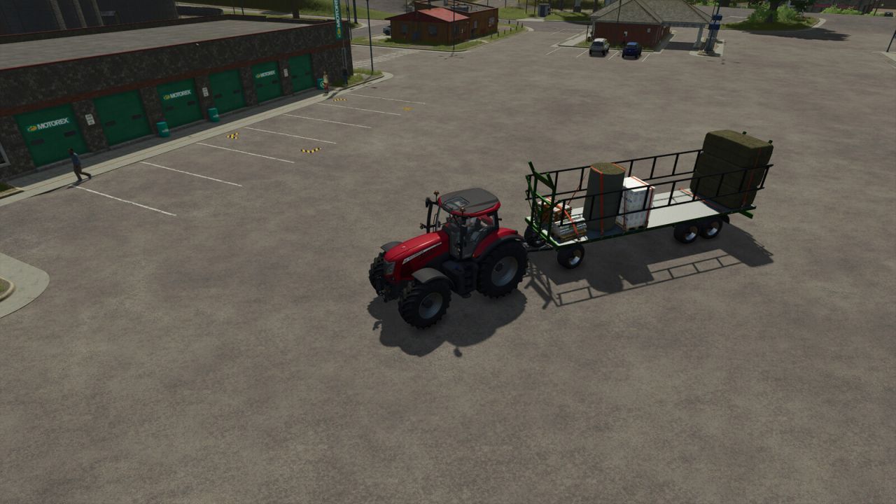 Efficient Krassort Bale Trailer with Auto-Loading for FS25
